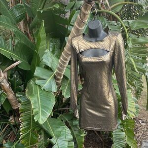 Gold metallic zebra print dress with cutouts and shoulder pads